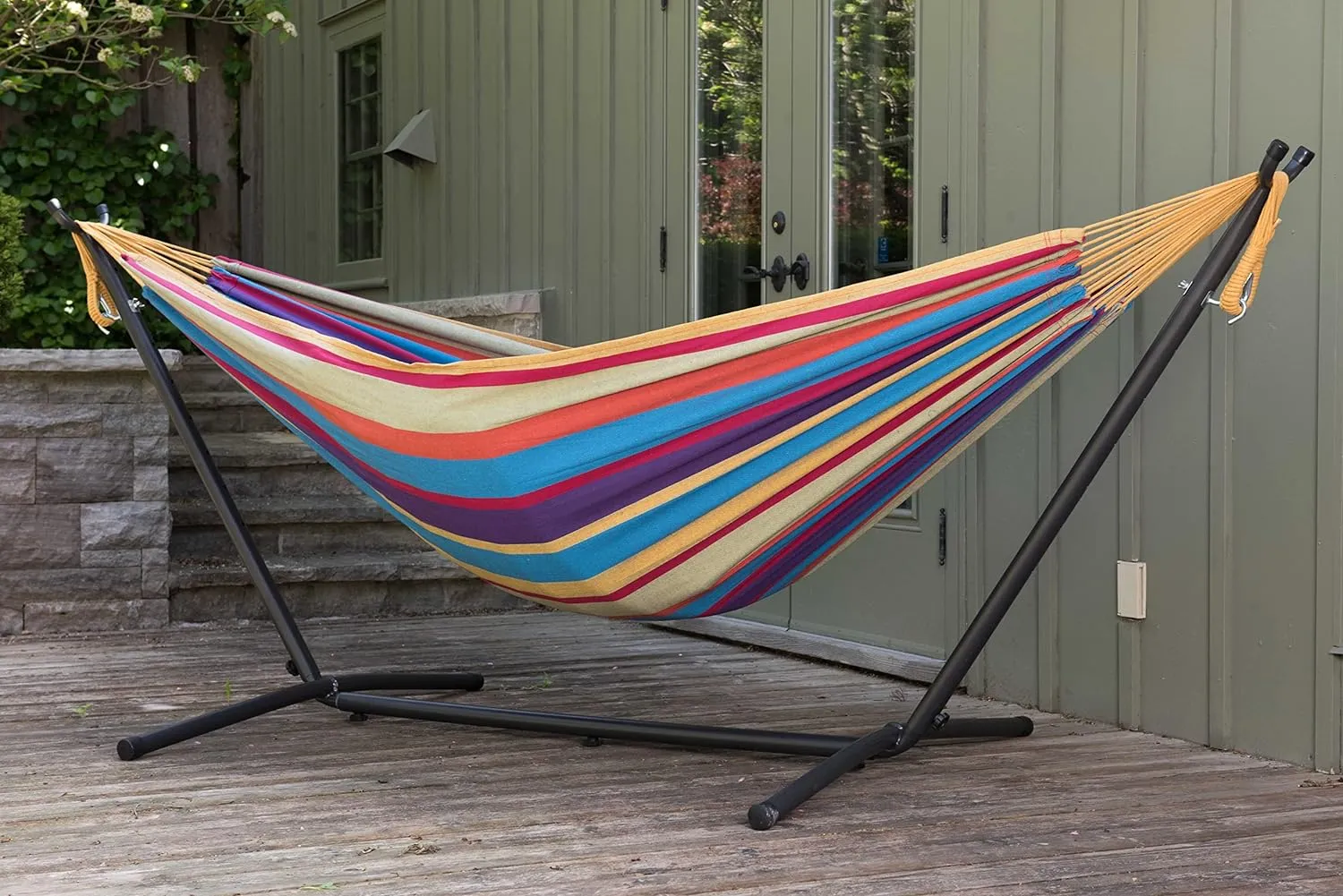 Vivere Double Cotton Hammock with Space Saving Steel Stand, Upgraded Polyester End Strings 450 lb Capacity - Premium Carry Bag Included - USA Grown Cotton (Tropical)